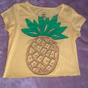Fun pineapple Tee fits like a small